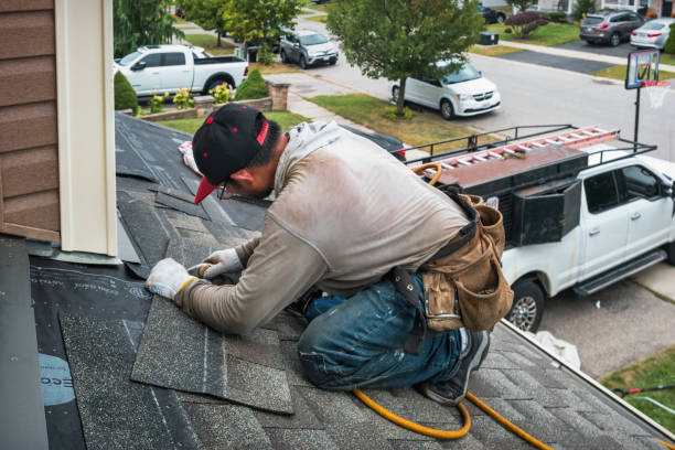 Professional Roofing technician working in Mccutcheon Field, NC